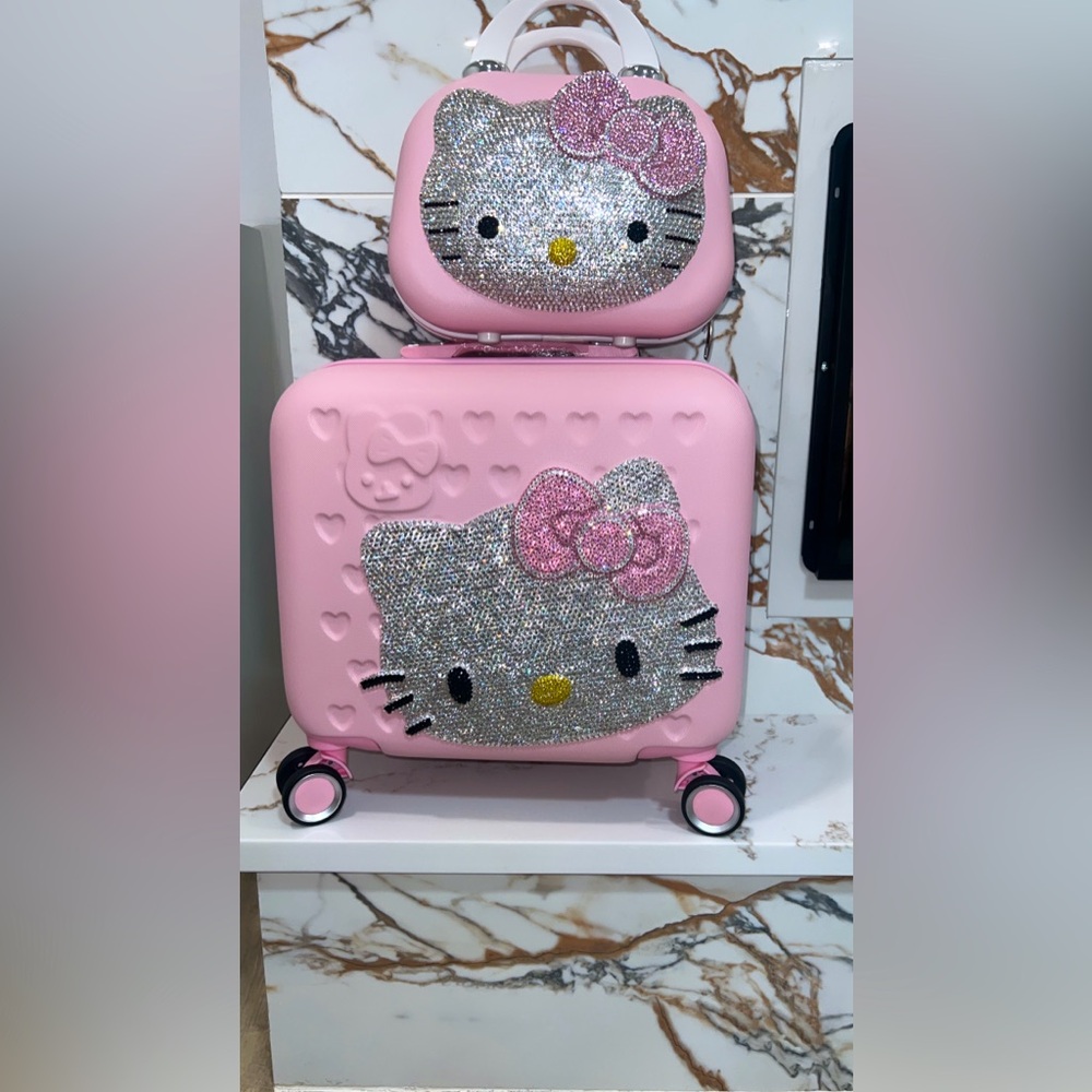 Hello kitty luggage set with makeup bag